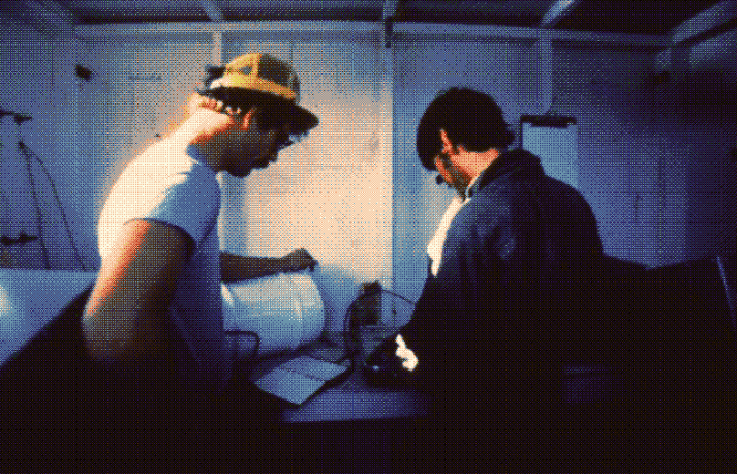 Rangers inspecting field equipment