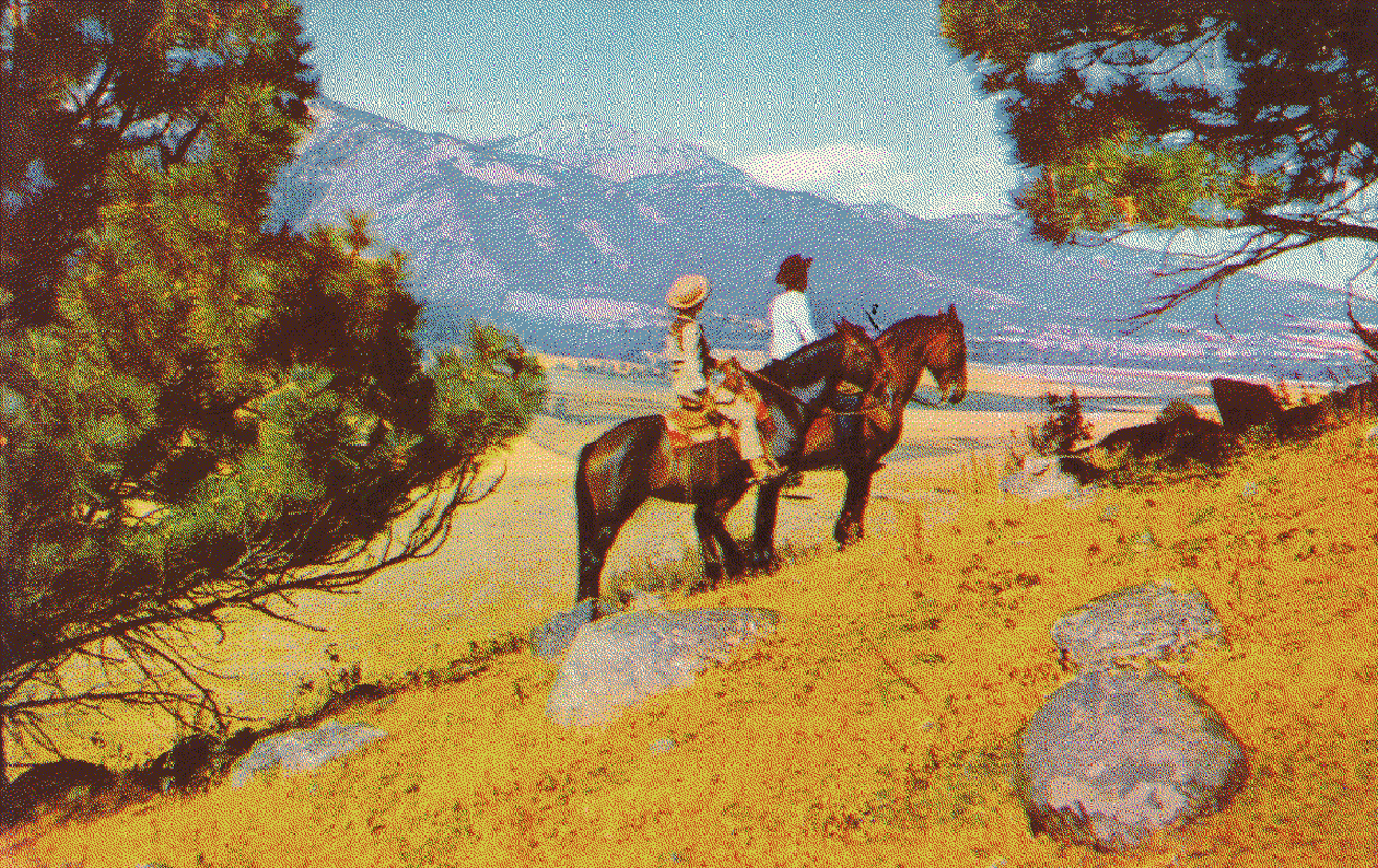 Two rangers riding horses